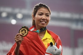 Vận động viên Bùi Thị Thu Thảo giành huy chương Vàng nội dung nhảy xa nữ tại ASIAD 2018. (Nguồn: AFP/TTXVN)