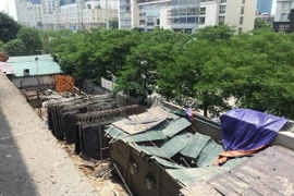 Hiện trường vụ tại nạn đứt cẩu tháp. (Ảnh: Nguyễn Thắng/TTXVN)