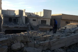 Một tòa nhà bị phá hủy trong cuộc không kích IS ở thành phố Fallujah ngày 9/12. (Nguồn: THX/TTXVN)