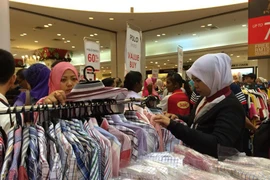 Giảm giá cuối năm tại một trung tâm mua sắm ở thủ đô Kuala Lumpur. (Ảnh: Kim Dung/Vietnam+)