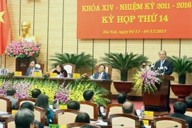 Chủ tịch Quốc hội Nguyễn Sinh Hùng dự và phát biểu tại phiên khai mạc kỳ họp lần thứ 14, Hội đồng nhân dân Thành phố Hà Nội khóa XIV, nhiệm kỳ 2011-2016. (Ảnh: Nhan Sáng/TTXVN)