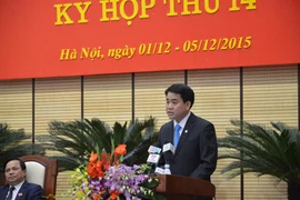 Ông Nguyễn Đức Chung phát biểu sau khi được bầu làm Chủ tịch UBND thành phố Hà Nội. (Ảnh: Nguyễn Văn Cảnh/Vietnam+)
