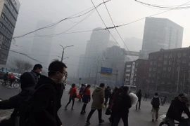 Khói bụi bao phủ thành phố Bắc Kinh,Trung Quốc ngày 14/12. (Nguồn: AFP/TTXVN)
