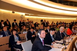 Đoàn Việt Nam tham dự Phiên họp Cấp cao và Khóa họp 28 Hội đồng nhân quyền của LHQ. (Ảnh: Tố Uyên/TTXVN)