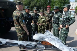 Binh sỹ Nga và Trung Quốc tham gia tập trận. (Nguồn: Sputnik)