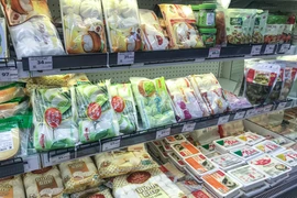 Các sản phẩm chay như bánh bao, tàu hũ, nấm, bột đậu... xuất hiện nhiều tại các hệ thống siêu thị. (Ảnh: Việt Anh/Vietnam+)