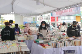 Loạt sự kiện 'Hội sách khai Xuân' mang đến cho độc giả cơ hội sở hữu những đầu sách mới với giá ưu đãi cùng nhiều phần quà hấp dẫn. (Ảnh: Việt Anh/Vietnam+)