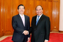 Thủ tướng Nguyễn Xuân Phúc tiếp ông Quách Thanh Côn, Bộ trưởng Bộ Công an Trung Quốc đang có chuyến thăm và làm việc tại Việt Nam. (Ảnh: Thống Nhất/TTXVN)