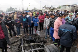 Hiện trường vụ đánh bom ở Sard City thuộc thủ đô Baghdad hôm 2/1. (Nguồn: THX/TTXVN)