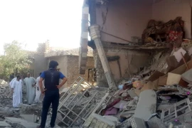 Một tòa nhà bị phá hủy sau cuộc không kích ở Fallujah. (Nguồn: THX/TTXVN)