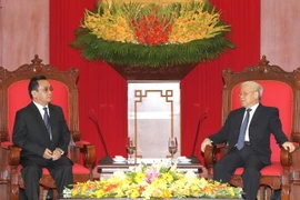 Tổng Bí thư Nguyễn Phú Trọng tiếp Thủ tướng Lào Thoongsing Thammavong. (Ảnh: Trí Dũng/TTXVN)