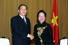 Phó Chủ tịch nước Nguyễn Thị Doan tiếp Phó Bí thư Ủy ban kiểm tra kỷ luật Trung ương Đảng Cộng sản Trung Quốc Dương Hiểu Độ, đang thăm và làm việc tại Việt Nam. (Ảnh: Nguyễn Dân/TTXVN)