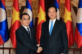 Thủ tướng Nguyễn Tấn Dũng hội đàm với Thủ tướng CHDCND Lào Thongsing Thammavong đang thăm và làm việc tại Việt Nam. (Ảnh: Đức Tám/TTXVN)