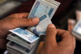 Đồng afghani giảm xuống mức thấp kỷ lục. (Nguồn: thefrontierpost.com)