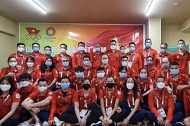 Ông Trần Đức Phấn, Trưởng đoàn, và đoàn thể thao Việt Nam tham dự Olympic Tokyo 2020. (Ảnh: TTXVN phát)