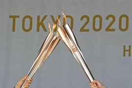 Lễ rước đuốc Olympic tại Tokyo, Nhật Bản, ngày 18/7. (Ảnh: Kyodo/TTXVN)