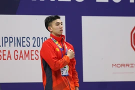 Huy Hoàng giành huy chương Vàng 1.500m. (Ảnh: Vietnam+)