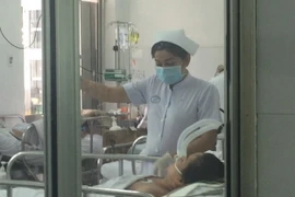 Bệnh nhân nhiễm cúm A/H1N1 điều trị tại Bệnh viện Chợ Rẫy. (Ảnh: Đinh Hằng/TTXVN)