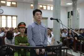 Bị cáo Hsu Minh Jung trước vành móng ngựa. (Ảnh: Nguyễn Cúc/TTXVN)