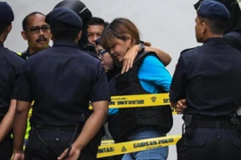 Đoàn Thị Hương được đưa đến Tòa. (Nguồn: Getty Images)