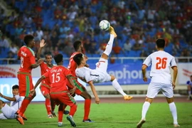U23 Việt Nam (áp trắng) đánh bại U23 Oman. (Ảnh: Trọng Đạt/TTXVN)