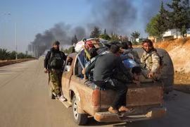 Phiến quân đã bắt đầu rời khỏi thành phố Aleppo của Syria. (Nguồn: Reuters)