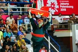 Trần Đình Nam giành huy chương vàng thứ tư cho đoàn thể thao Việt Nam. (Ảnh: Trọng Tuệ-Phúc Hưng/TTXVN)