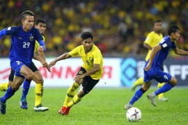 Malaysia (áo vàng) liệu có gây sốc trước Thái Lan. (Nguồn: Fox Sports)