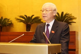 Tổng Bí thư, Chủ tịch nước Nguyễn Phú Trọng trình bày Tờ trình về việc đề nghị Quốc hội phê chuẩn Hiệp định CPTPPcùng các văn kiện liên quan. (Ảnh: Trí Dũng/TTXVN)