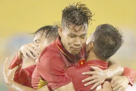 Các cầu thủ U22 Việt Nam. (Ảnh: Quang Nhựt/TTXVN)