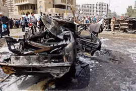 Hiện trường một vụ đánh bom ở Iraq. (Nguồn: AP)