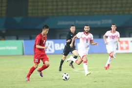 Pha dẫn bóng của Phan Văn Đức. (Ảnh: Hoàng Linh/TTXVN)