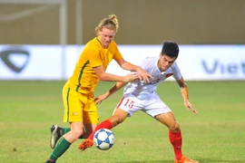 U19 Việt Nam (áo trắng) bại trận trước U19 Australia. (Nguồn: Minh Đức/TTXVN)