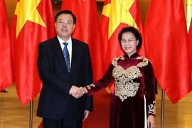 Chủ tịch Quốc hội Nguyễn Thị Kim Ngân đón tiếp Ủy viên trưởng Nhân đại Trung Quốc Trương Đức Giang. (Ảnh: Trọng Đức/TTXVN)