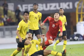 Quảng Hải sẽ cùng đồng đội vượt qua Malaysia để vô địch AFF Suzuki Cup 2018. (Ảnh: Hoàng Linh/TTXVN)