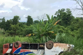 Hình ảnh chiếc xe bị lật trong vụ tai nạn. (Ảnh: Phạm Kiên/Vietnam+)