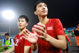 Đình Trọng và Đoàn Văn Hậu. (Ảnh: Trọng Đạt/TTXVN)