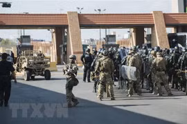 Binh sỹ Mỹ tham gia cuộc diễn tập ở Hidalgo của Texas, biên giới Mỹ-Mexico hôm 5/11 năm ngoái. (Ảnh: AFP/TTXVN)