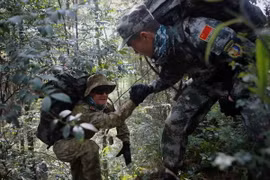 Binh sỹ Trung Quốc và Australia trong một cuộc tập trận. (Nguồn: China Daily)