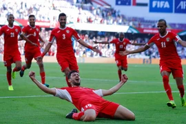 Anas Bani Yaseen (trước) ăn mừng sau khi ghi bàn vào lưới Australia. (Nguồn: AP)