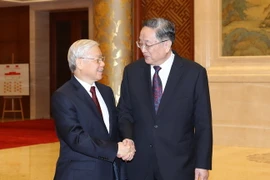 Tổng Bí thư Nguyễn Phú Trọng hội kiến với Ủy viên Thường vụ Bộ Chính trị, Chủ tịch Chính hiệp Trung Quốc Du Chính Thanh. (Ảnh: Trí Dũng/TTXVN)