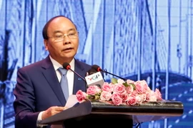 Thủ tướng Nguyễn Xuân Phúc dự Hội nghị xúc tiến đầu tư Hà Nội. (Ảnh: Thống Nhất/TTXVN)