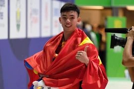 Huy Hoàng đóng góp 2 HCV cho đoàn Thể thao Việt Nam. (Ảnh: Vũ Anh Tú/TTXVN)