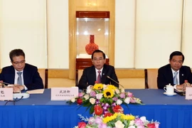 Đồng chí Vũ Hồng Khanh, Đoàn đại biểu Mặt trận Tổ quốc thành phố Hà Nội, phát biểu tại buổi làm việc. (Ảnh: Trung Kiên/TTXVN)