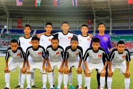 Hồng Sơn, hàng dưới thứ tư từ trái sang. (Ảnh: Hoàng Tuấn/Vietnam+)