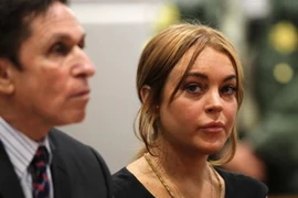 Lohan và luật sư Mark Heller. (Nguồn: EPA)