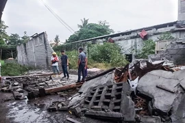 Cảnh đổ nát sau một động đất ở Philippines. (Ảnh: THX/TTXVN)