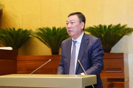 Tổng Thanh tra Chính phủ Đoàn Hồng Phong trình bày Báo cáo về công tác tiếp công dân, giải quyết khiếu nại, tố cáo. (Ảnh: Doãn Tấn/TTXVN)
