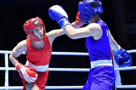 Võ sỹ Nguyễn Thị Tâm (áo đỏ) giành huy chương vàng tại giải vô địch boxing châu Á 2022. (Ảnh: ASBC) 