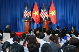 Chủ tịch nước Trần Đại Quang (bên phải) và Tổng thống Barack Obama tại cuộc họp báo. (Ảnh: Nhan Sáng/TTXVN)